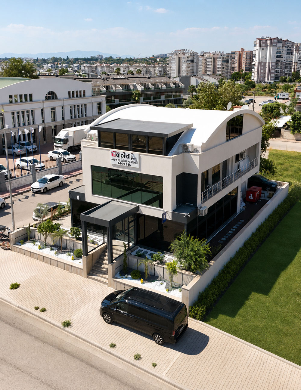Alpi Dent Antalya — our modern dental clinic building in Muratpaşa, Antalya